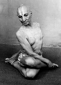 Krishnamacharya doing a yoga posture. famous yoga teachers in india