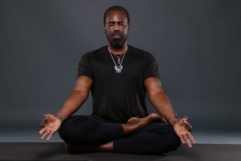 yirser ra hotep performing Kemetic Yoga Poses Nefertem - Padmasana (Lotus Pose)